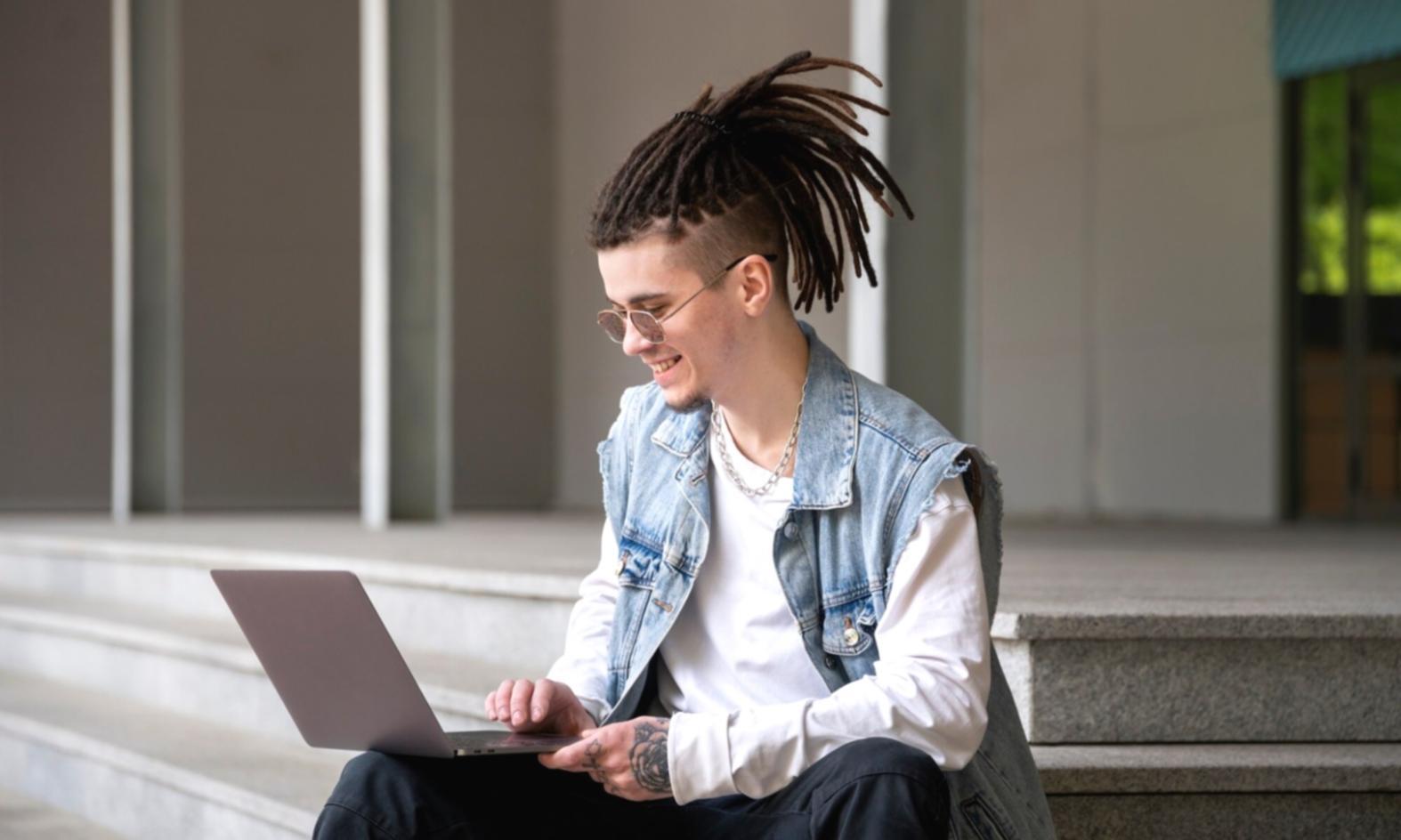 Person reviewing financial documents with calculator and charts on desk