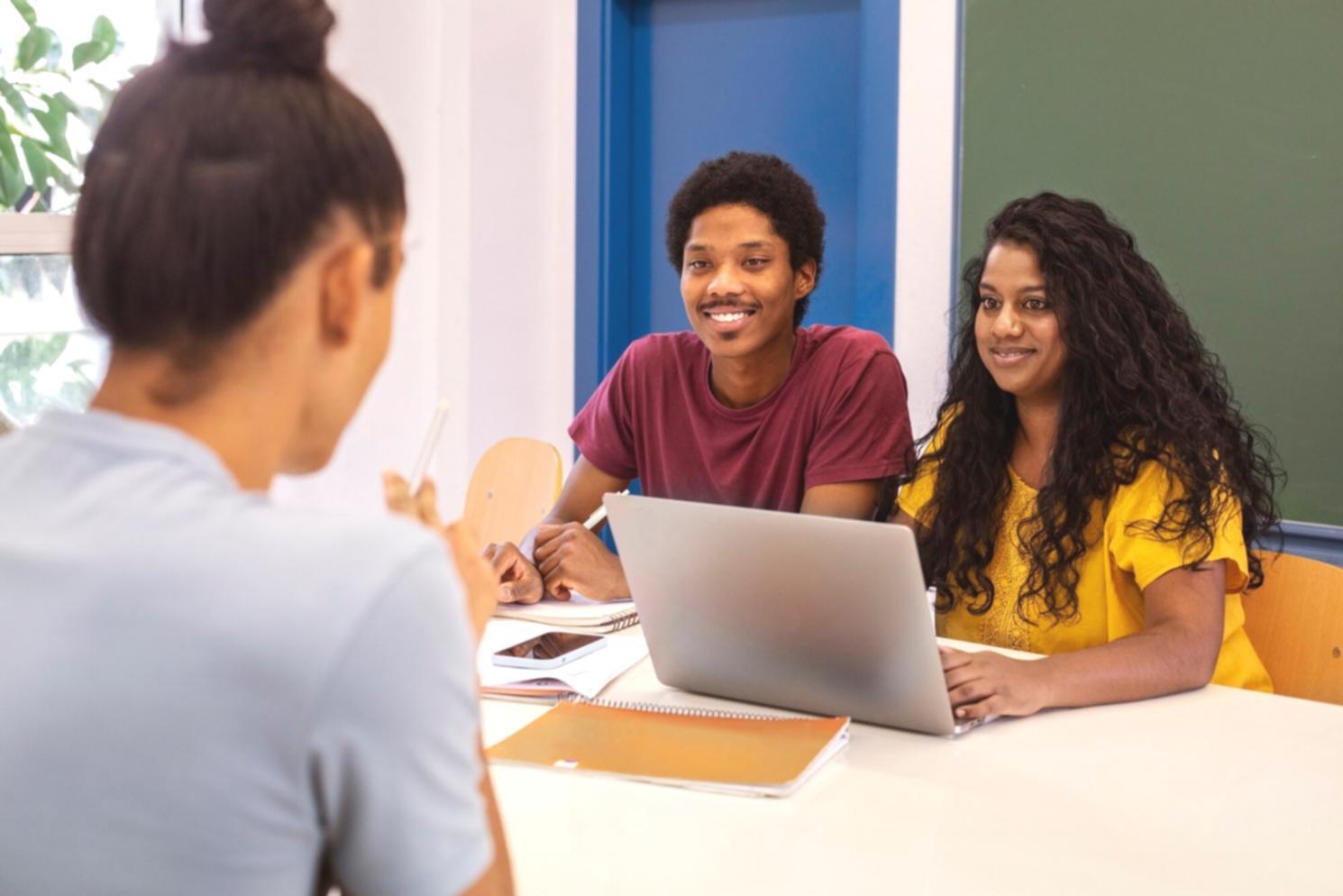 Business professionals collaborating on financial planning in a modern meeting room